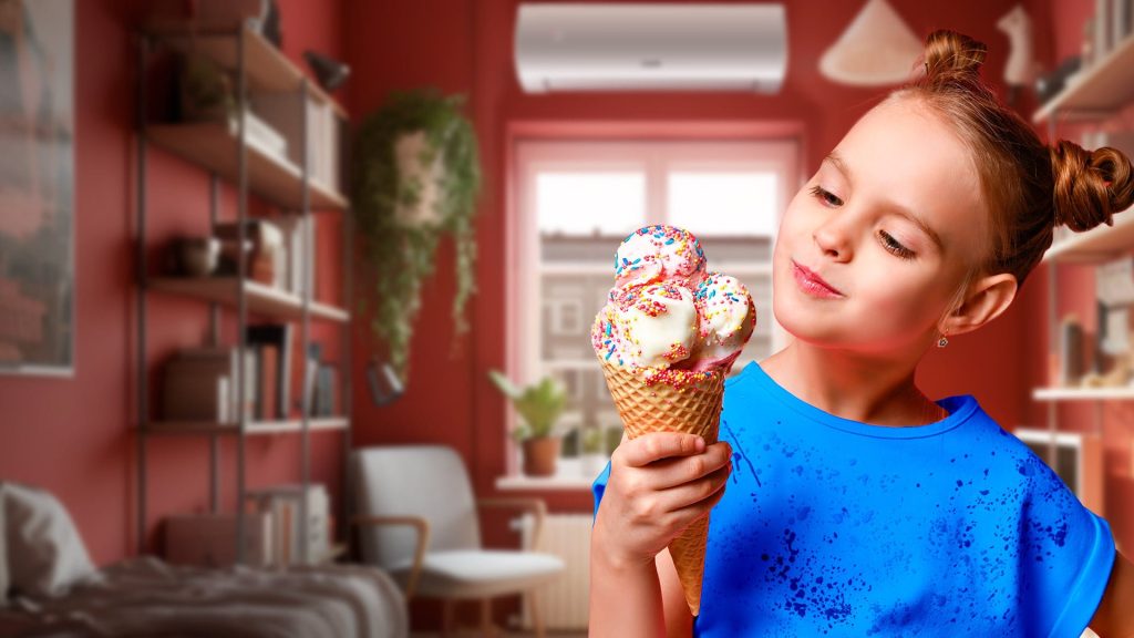 Sinipaitainen tyttö syö jäätelöä olohuoneessa, jonka taustalla näkyy ilmalämpöpumppu.